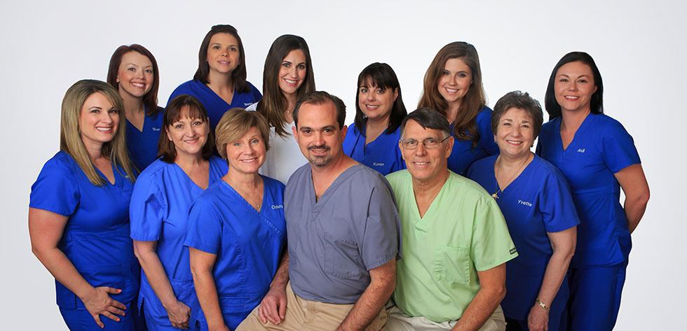 Drs. Plaisance and deJong with dental team near Metairie