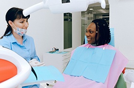 Woman at consultation with cosmetic dentist