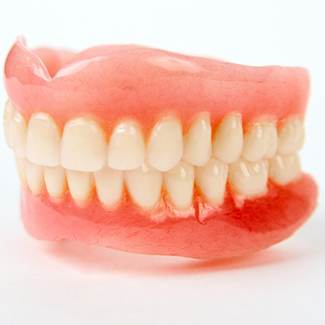 Close-up of two full dentures