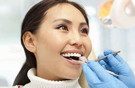 Woman receiving dental treatment