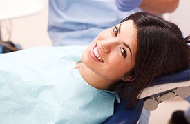 Smiling woman in dental chair