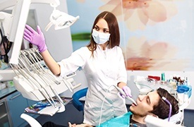 Man in dental chair receiving treatment