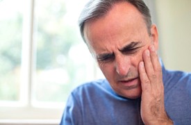 An older man with a dental emergency.