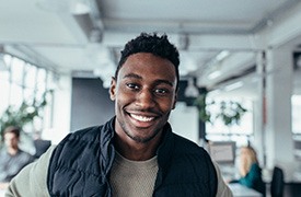 Man smiling with his veneers in River Ridge